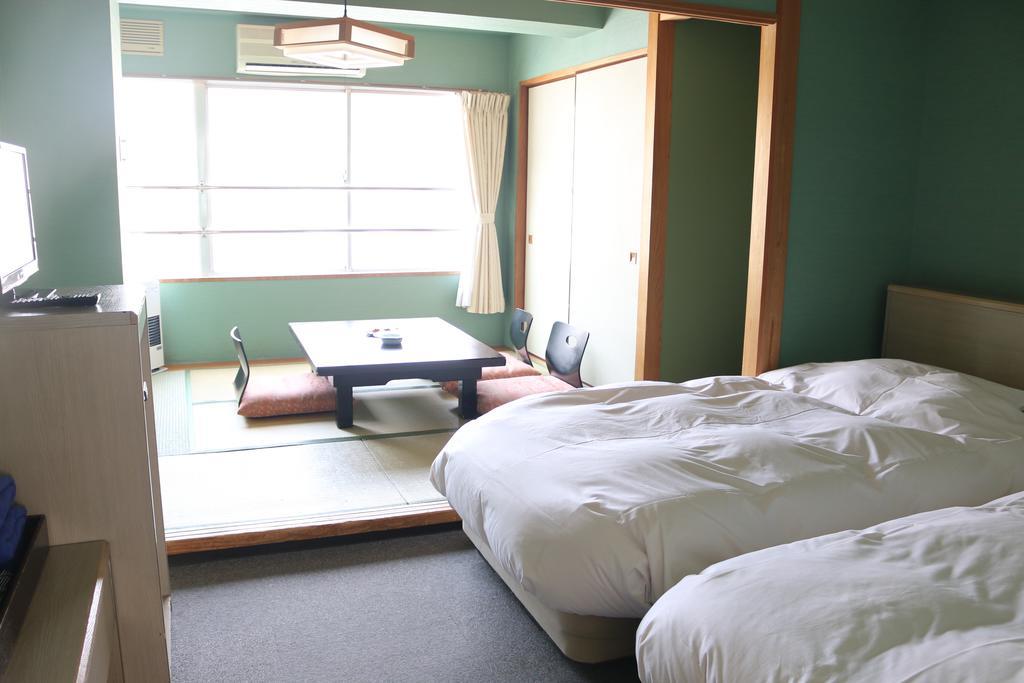 Hotel Sankeien Sapporo Chambre photo