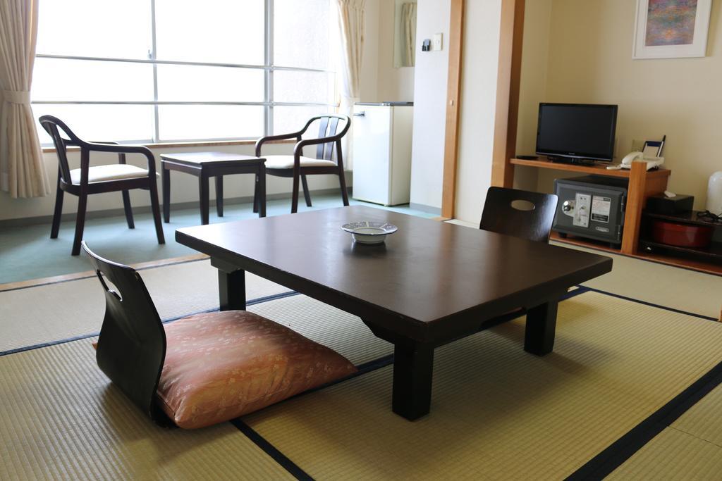 Hotel Sankeien Sapporo Chambre photo